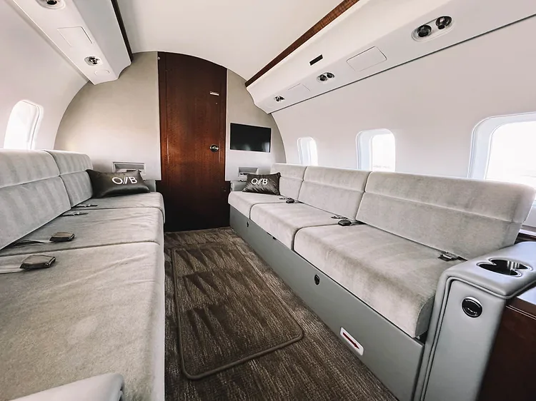 Large-cabin jet divan cabin after carpet shampoo and extraction