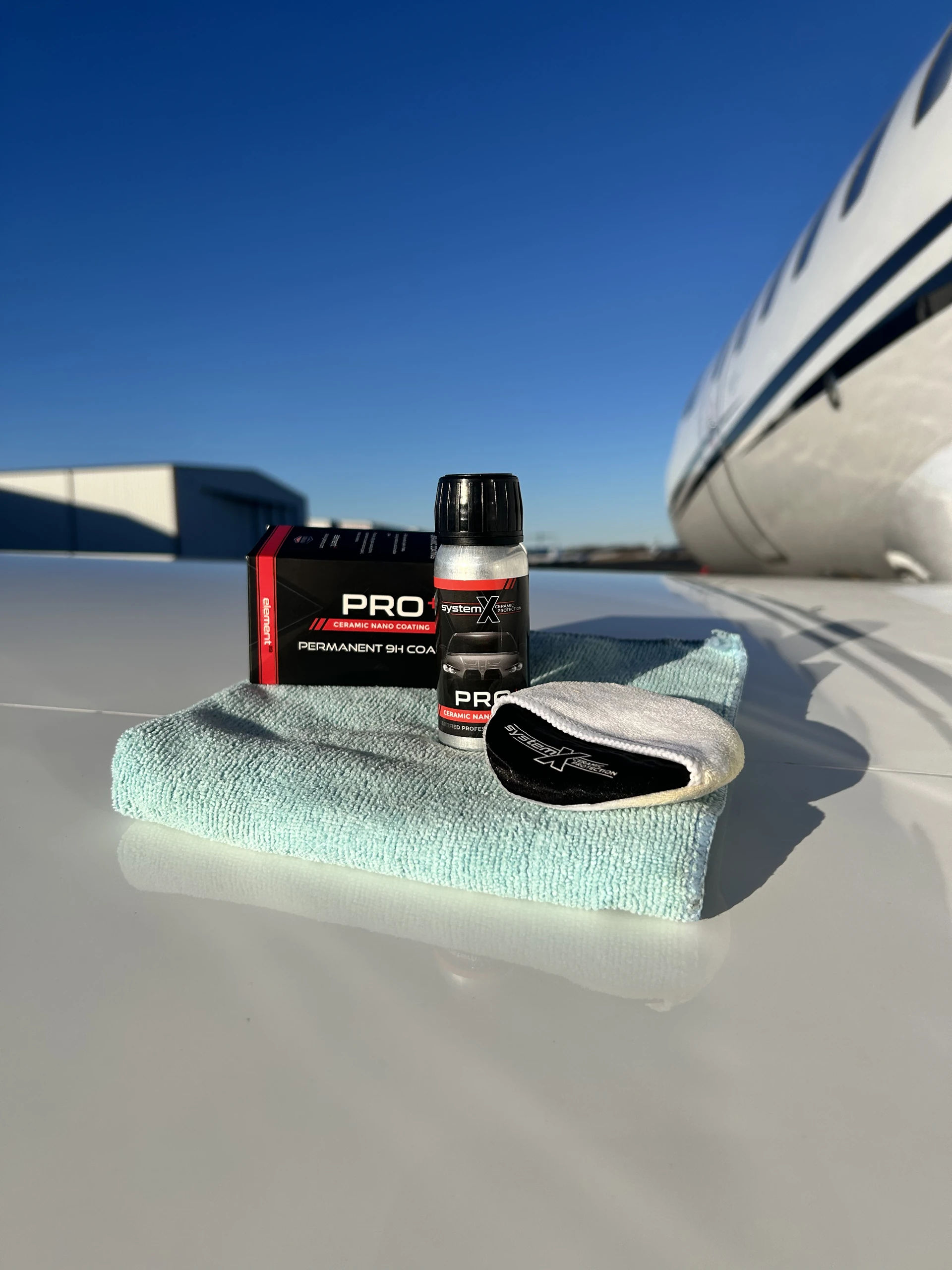System-X Max G+ ceramic coating during application on a business jet