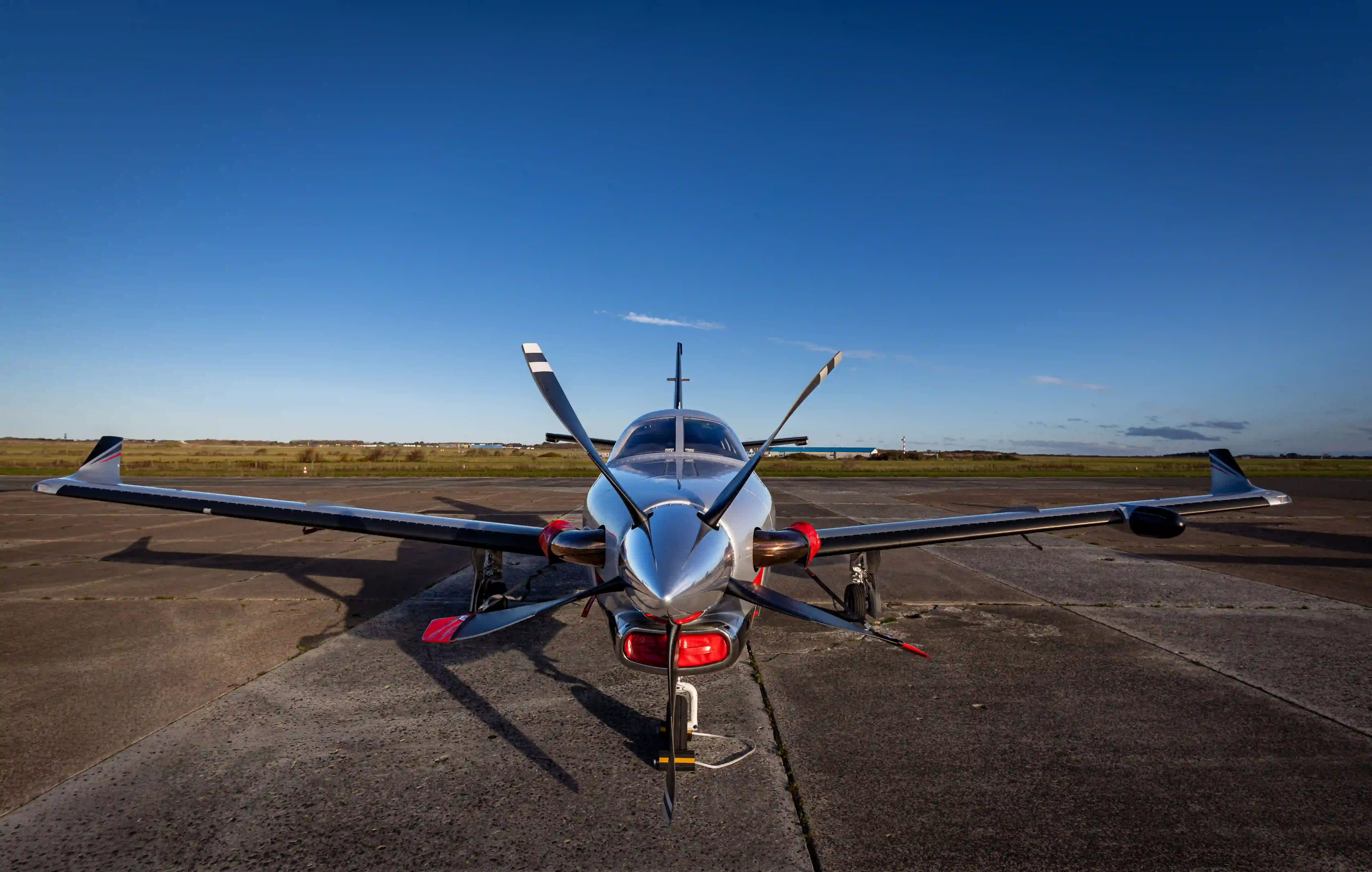 Freshly detailed Daher TBM turboprop head-on, with clean spinner, propeller and leading edges